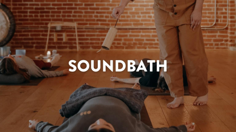 person relaxing with the word Soundbath